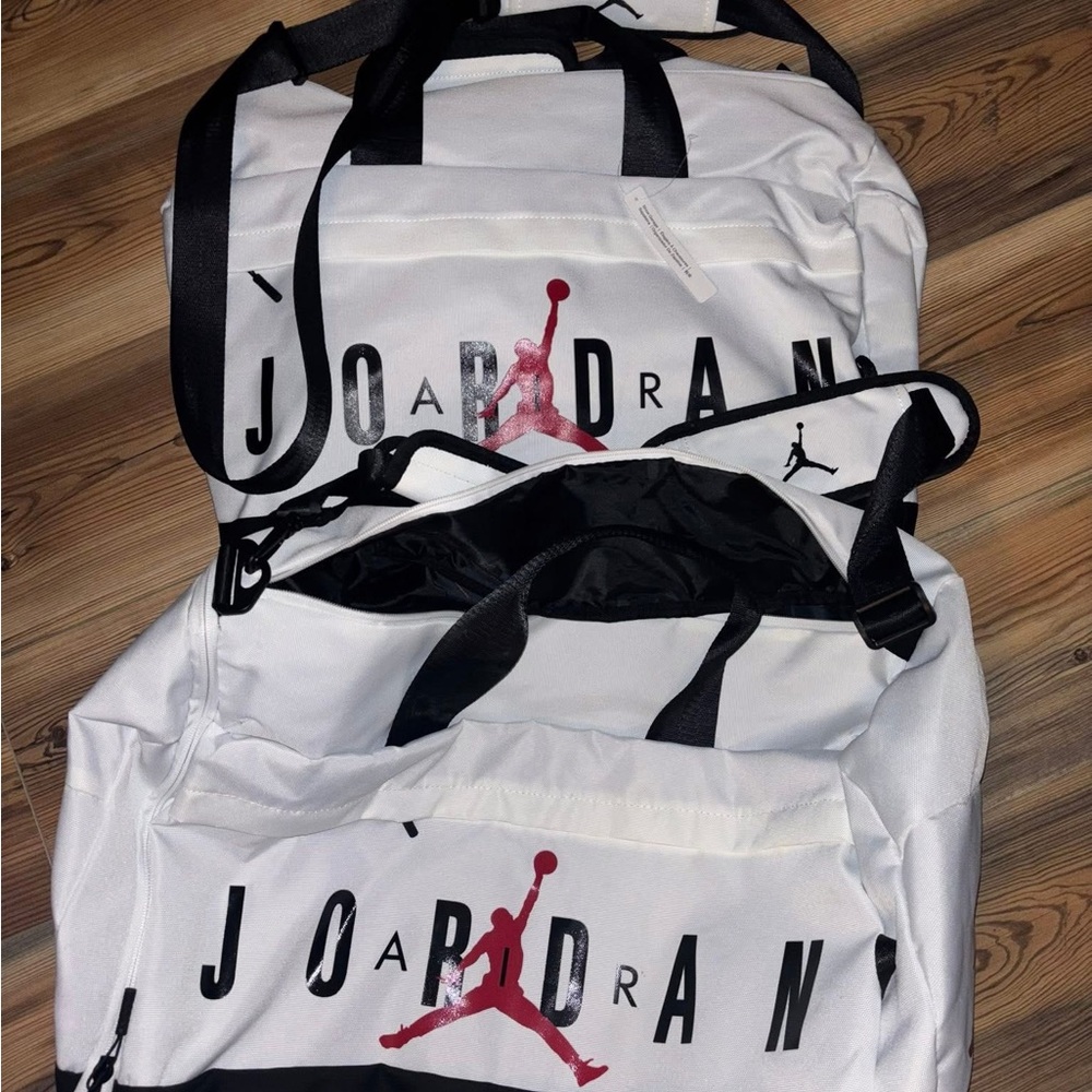 Jordan White and Black Duffle Bag with Red Logo